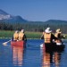 Mt. Bachelor provides a spectacular backdrop  to canoeists paddling in Hosmer Lake near Bend, Ore.  Photo by Christian Heeb/Wanderlust Tours