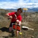 James Varner stakes down a trail race sign